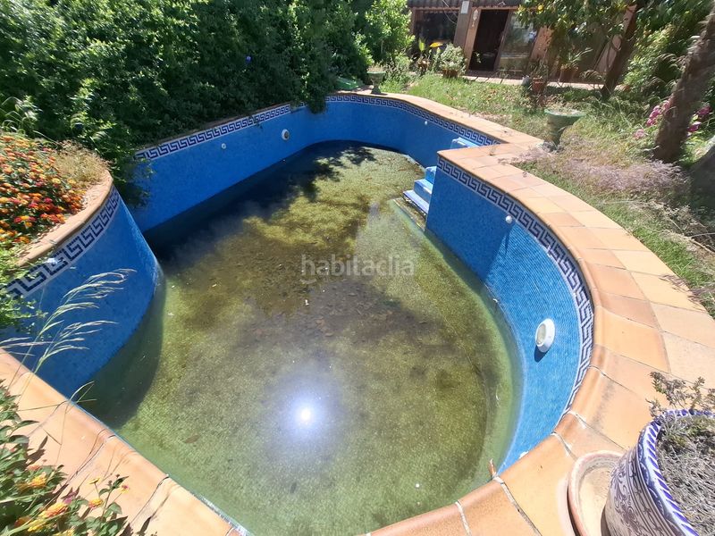 Foto 40940d67-b5ef-4270-b947-390f734c2a6e. Casa adossada amb xemeneia calefacció aparcament piscina a Jaén