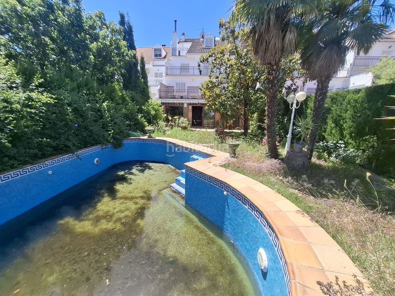 Foto a48f359e-badb-4156-a650-ccdbe5d7c71d. Casa adossada amb xemeneia calefacció aparcament piscina a Jaén