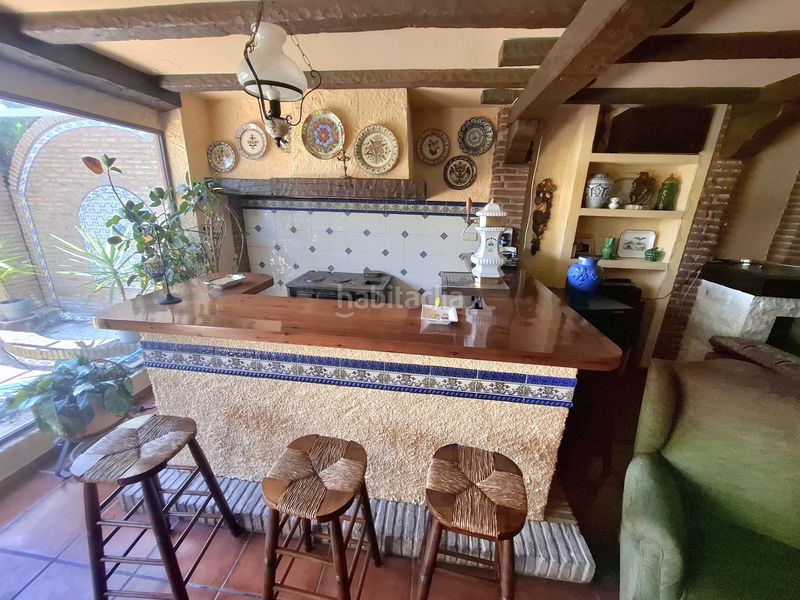 Foto ddc04d14-abd8-451a-8ef5-c98c32573067. Casa adossada amb xemeneia calefacció aparcament piscina a Jaén