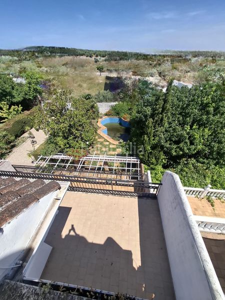 Foto eaa41e1e-2eaa-42ba-9d8b-1ce16df59dcc. Casa adossada amb xemeneia calefacció aparcament piscina a Jaén
