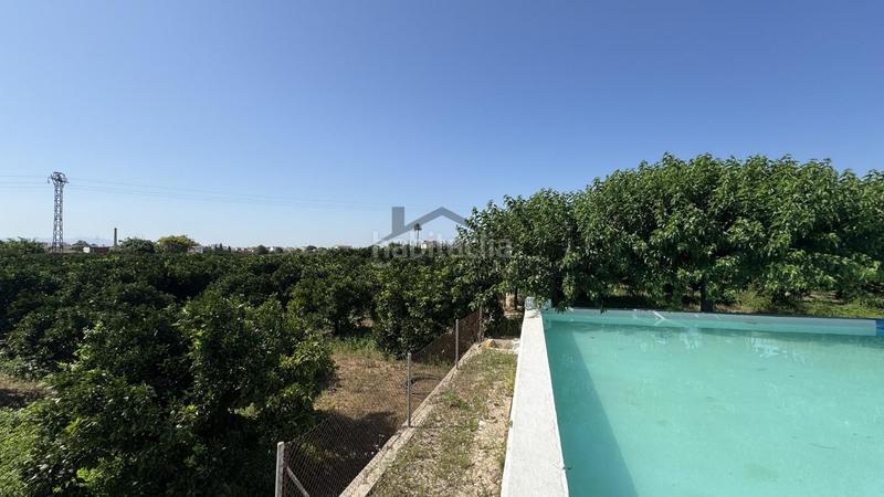Foto f6b1e62f-f608-466a-98dd-992f7f40e0cb. Finca rústica  en venta , valencia en Carcaixent