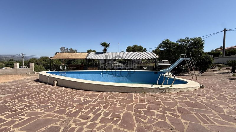 Foto df102cce-9729-42ce-95bc-32e09c2ef84c. Casa amb piscina a Alberic