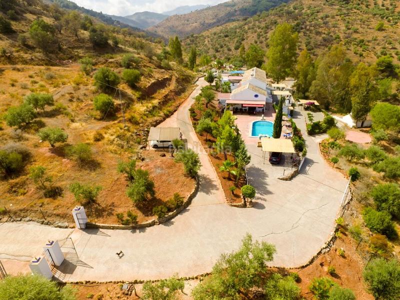 Foto 725ca6fe-c755-4a1a-9629-2c351ba0f987. Bauernhof mit parking pool in Guaro