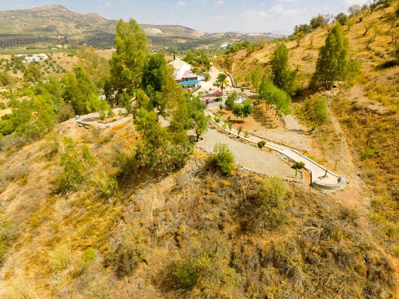 Foto ae3469fd-fe31-4d0f-a923-5792db392c39. Bauernhof mit parking pool in Guaro