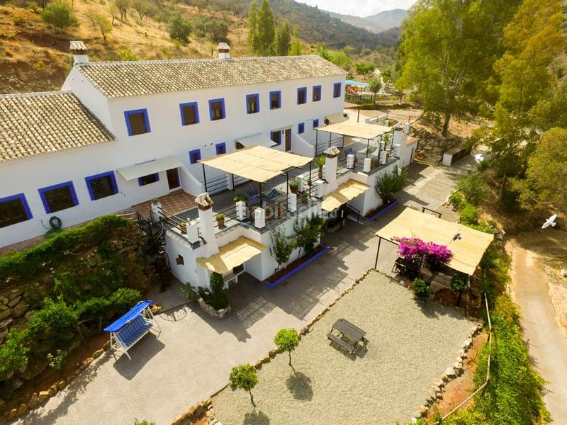 Foto bae3092d-ec05-4d74-a5a9-0a98252c3983. Bauernhof mit parking pool in Guaro