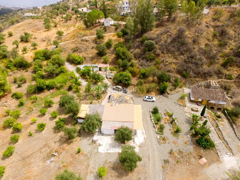 Foto c5ae5995-eb5d-444a-979d-b1e19b58801e. Bauernhof mit parking pool in Guaro