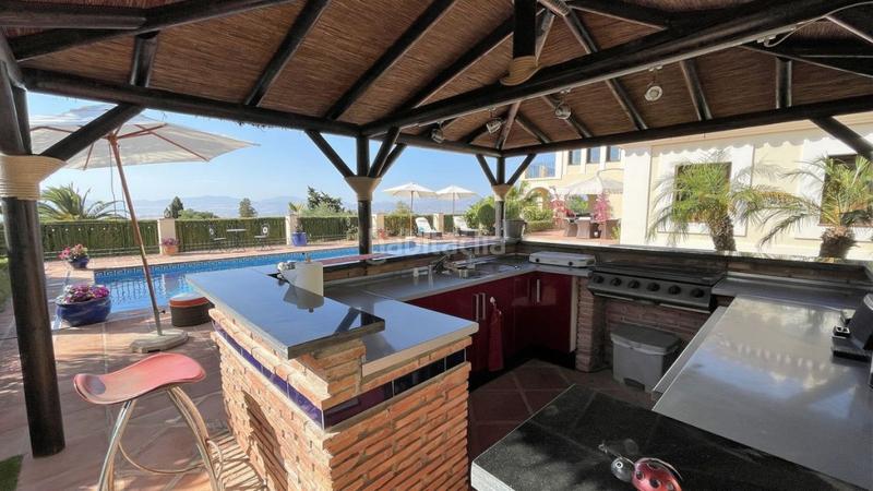 Foto 5c0010c3-f1b6-47b2-adb7-591cd86a6def. Chalet with heating parking pool in Centro Alhaurín el Grande