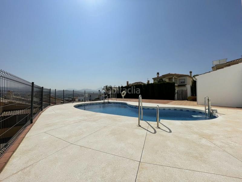 Foto 0db1a0c2-1918-4705-9521-b8c01ec72218. Casa pareada en Coín