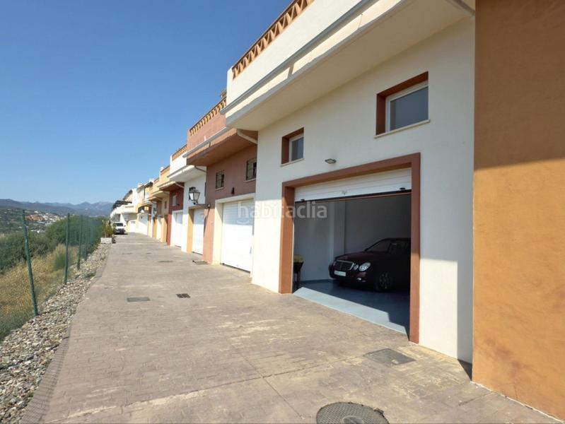 Foto 777b3a40-1435-45be-a144-fb0051c4f64e. Casa pareada en Coín