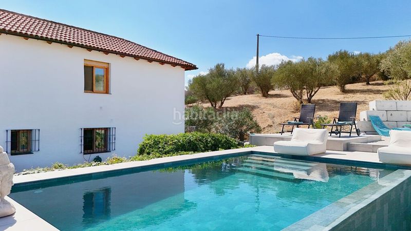 Foto 2bba1a51-88ac-4f53-b9fd-23864736abd6. Chalet en Coín