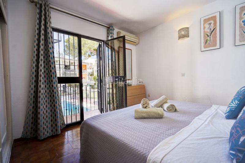 Foto 526f7c2a-64ce-4eb7-b54c-3cf2c62256e5. Casa bifamiliare con parcheggio piscina in Bello Horizonte - Lindasol Marbella