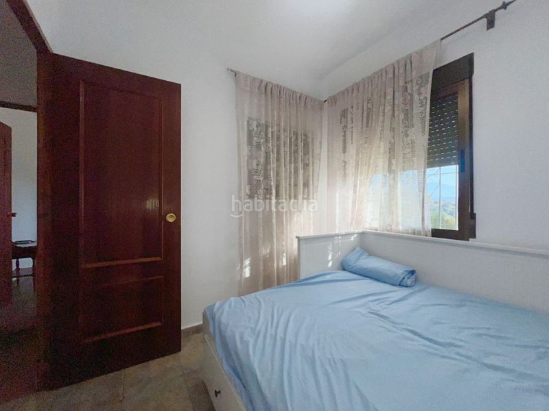 Foto 0f8c92c6-ad9b-47f9-bc27-ef30f917aff8. Casa aparellada amb piscina a Coín