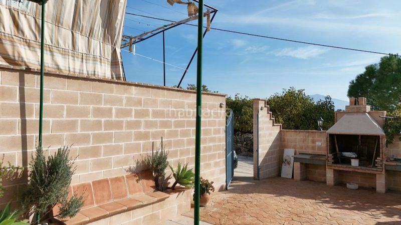 Foto 17514af1-5167-4a82-87c2-627e1b8e937a. Casa aparellada amb piscina a Coín