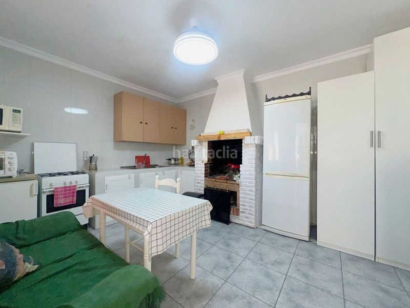 Foto 1a183d72-4ea1-4672-8e07-530f9543fe49. Casa aparellada amb piscina a Coín