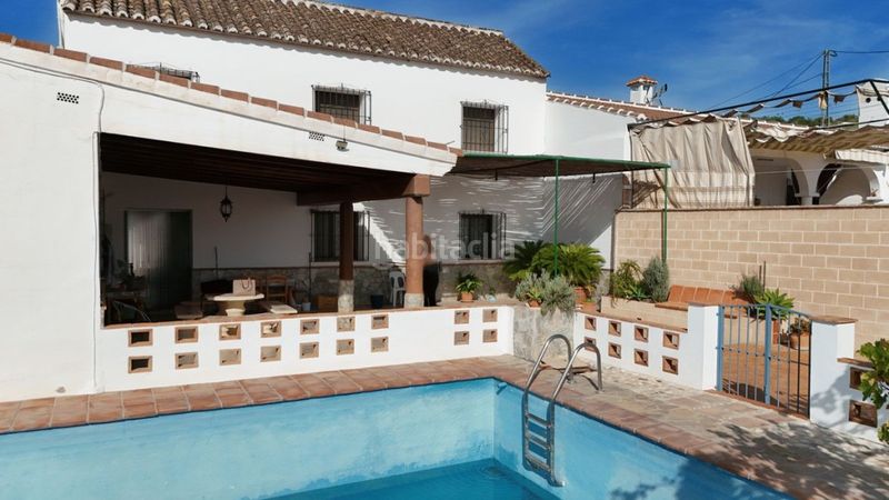 Foto 4487ded2-90cf-432f-a912-b8d5d34cb719. Casa aparellada amb piscina a Coín