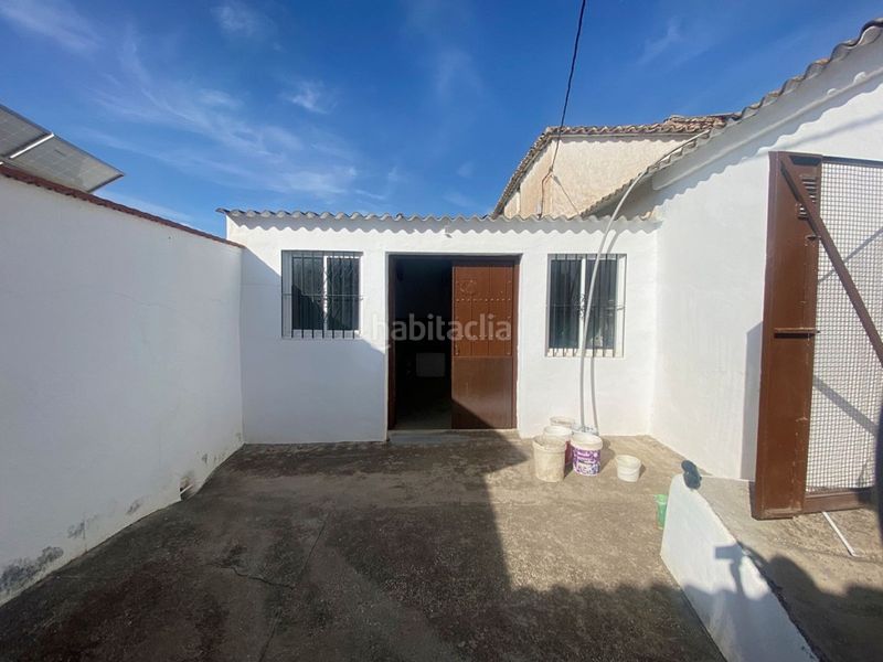 Foto e101a116-4785-4c04-9a6b-3da118711177. Casa aparellada amb piscina a Coín
