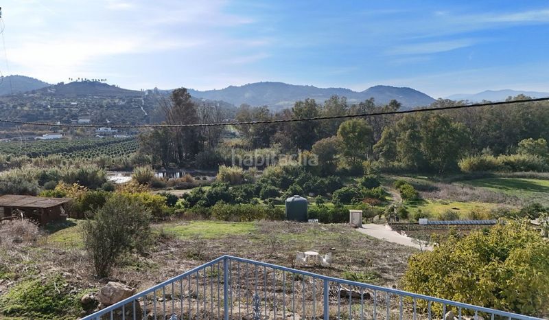 Foto f3ee1ad6-c878-4eac-acaf-aa5f6200ee2e. Casa aparellada amb piscina a Coín