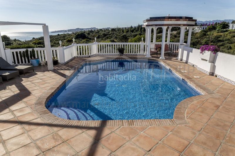 Foto 673373a7-6cf0-4c2b-b93a-b72823a4b343. Chalet with parking pool in El Faro de Calaburra - Chaparral Mijas