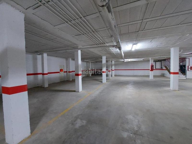 Foto add8d83d-af83-4d53-9a84-14f3ad74559b. Parking coche promoción de plazas de garaje en venta situada en Gines