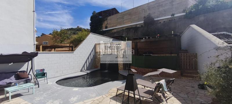 Foto 48f7fbde-163f-4676-98ac-6915b135cf89. Casa adossada amb calefacció aparcament piscina a Málaga