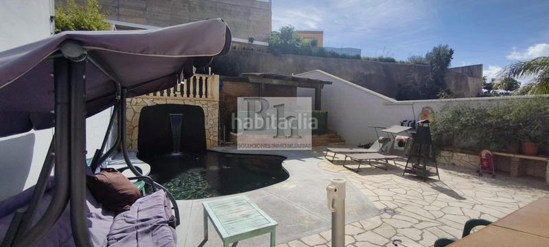 Foto 87aba563-a2c4-4cd8-8f4b-b8ff2357fcdd. Casa adossada amb calefacció aparcament piscina a Málaga