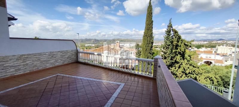 Foto a973a92f-0def-4e78-b8fd-4c3e91124ede. Casa adossada amb calefacció aparcament piscina a Málaga