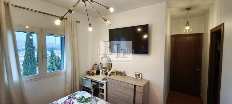 Foto d73b1a61-ad0d-49e1-bf36-3122aca8d8b3. Casa adossada amb calefacció aparcament piscina a Málaga