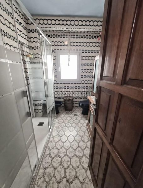 Foto 51598a71-688b-4ea2-a83c-b210530c58d7. Casa adossada a El Molinillo - Capuchinos Málaga