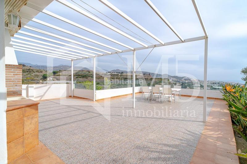 Foto 304bb325-0eb2-4faf-80e2-90b37890ce29. House with heating in Urbanización Santa Rosa Torrox