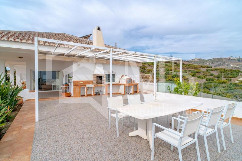 Foto 6b6d385c-7120-4558-b2ff-7fe213d2e735. House with heating in Urbanización Santa Rosa Torrox