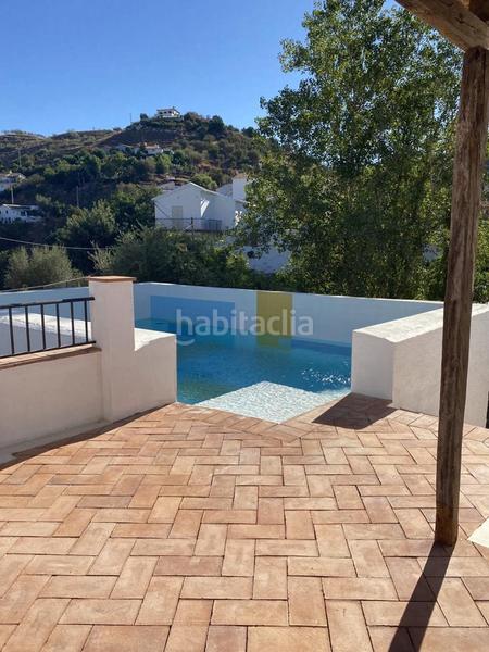 Foto ac9c156e-7853-4b27-bd92-0f307c71fbc2. Lloguer masia amb piscina a Canillas de Aceituno