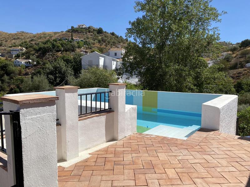 Foto fbfca426-9966-44e6-8961-839a6f560c15. Lloguer masia amb piscina a Canillas de Aceituno