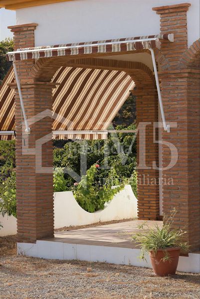 Foto 620d7cbb-504b-47f5-b030-d1c01bff2852. Masia amb piscina a Camino Viejo de Málaga Vélez - Málaga