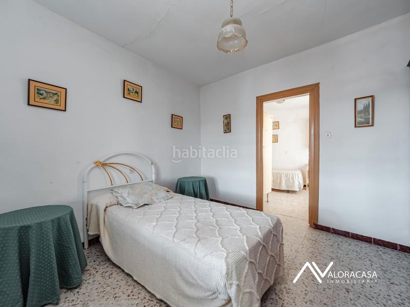 Foto b5c99d0a-65c1-40f6-bdf3-c58fd2ad9ae0. Casa  con local en venta en Álora