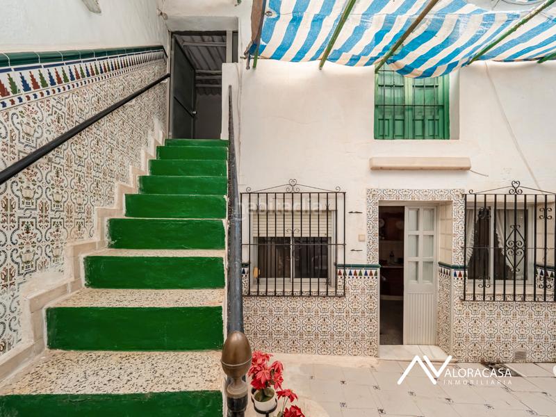Foto b90f14f0-abf4-4933-80d1-f1de9cc97520. Casa  con local en venta en Álora