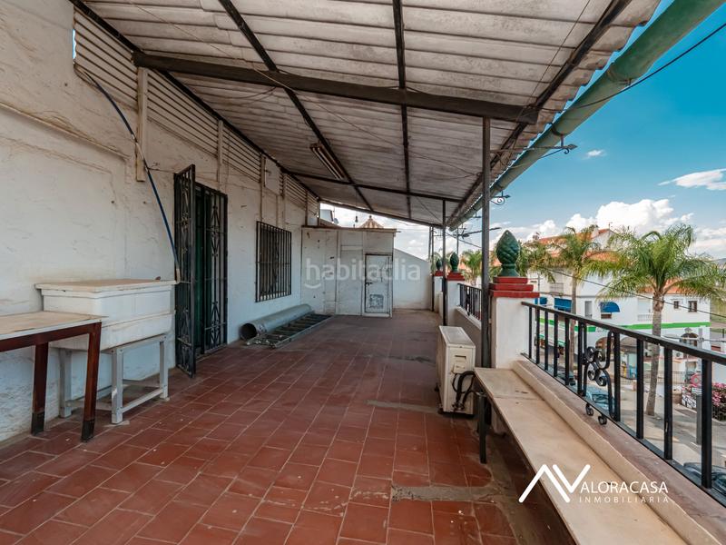 Foto bf0f8084-5c38-4161-9551-40d31927f77c. Casa  con local en venta en Álora