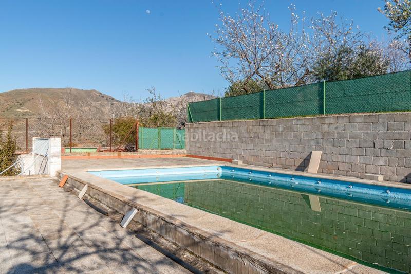 Foto 9a36f1d5-64d0-4bd8-aa41-5c3276d3c378. Masía cortijo con piscina en Monachil pueblo Monachil