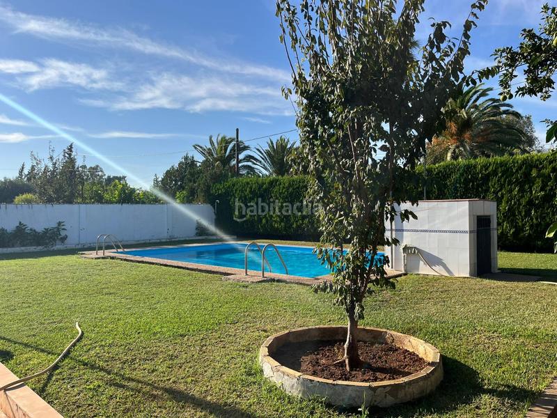 Foto 364ac0ee-065e-43f2-a3c4-2516a1886628. Chalet con parcheggio piscina in Oromana Alcalá de Guadaira