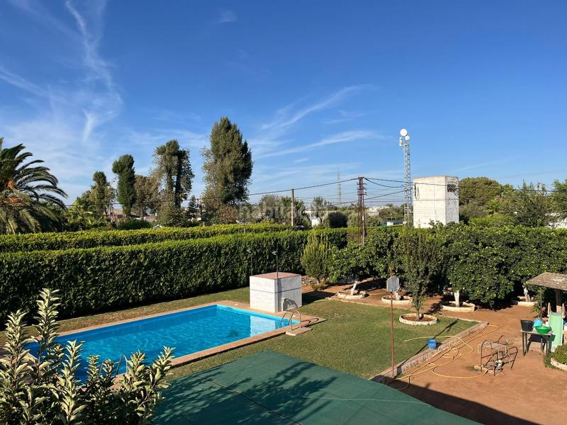 Foto d6e60caa-f211-45d7-beb5-c78cfcd33adb. Chalet con parcheggio piscina in Oromana Alcalá de Guadaira