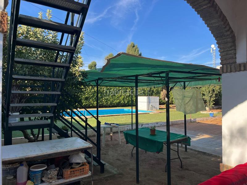 Foto dddb426f-8da4-488c-9be7-13169c6a54cb. Chalet con parcheggio piscina in Oromana Alcalá de Guadaira