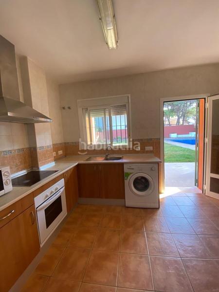 Foto 1bcb5ab8-5e21-405d-8117-6b1ccdb052fc. Chalet avec chauffage parking piscine dans La Barrosa Chiclana de la Frontera