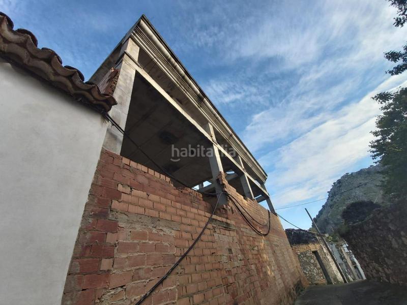 Foto 4c1ce2a6-e59c-4808-8651-d4ddb38d6f8a. Edificio oportunidad de inversión obra parada en calle puente alcolea, en Benaocaz