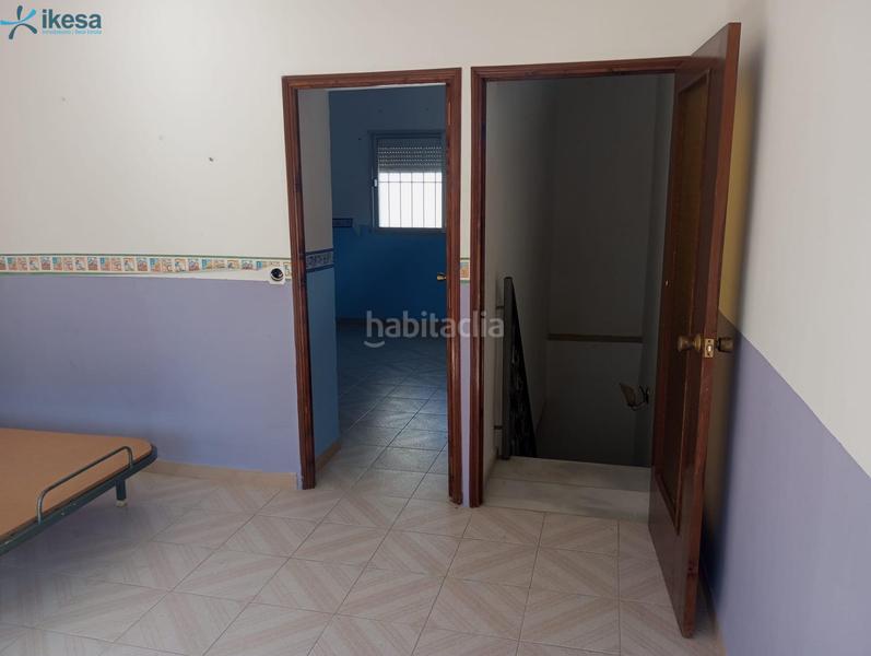 Foto 598cf8ef-4ec9-465a-9826-a12cd963ba6e. Casa adossada a Azuaga