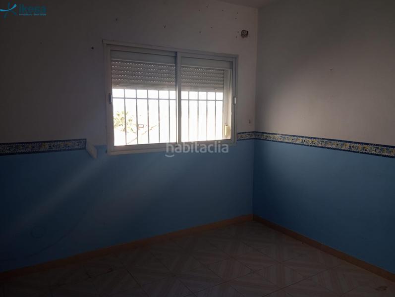 Foto e04ff311-e8ca-4c85-b9ca-4030682c2bb0. Casa adossada a Azuaga