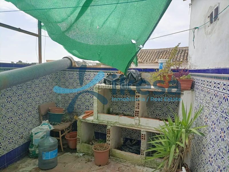 Foto 92b7e0fa-7935-467e-b832-40ddc9de75d4. Casa adossada a Baena