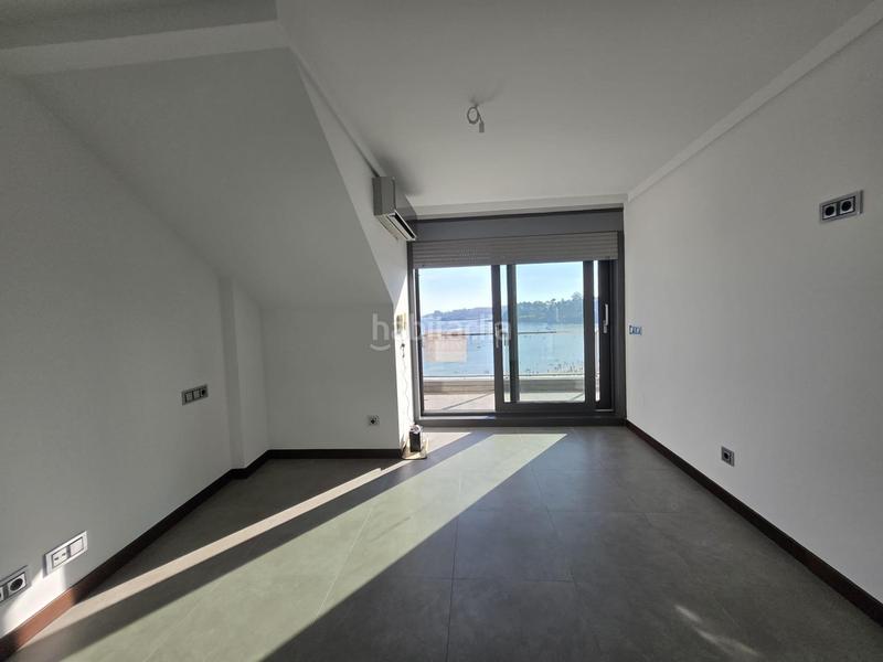 Foto ee217009-ef6c-412f-b485-cced10cf2e16. Piso  . primera línea de playa. en Sanxenxo pueblo Sanxenxo