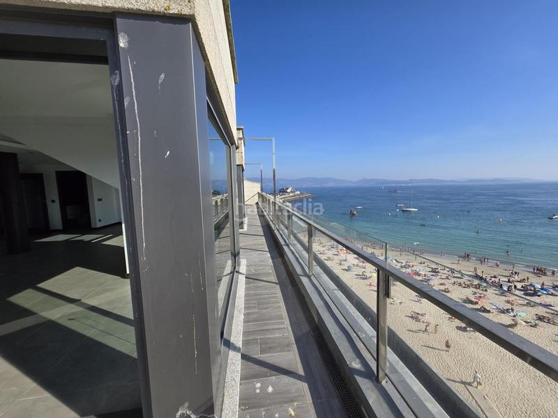 Foto fe0eb374-cd79-46d8-ad7b-aafc65a1e209. Piso  . primera línea de playa. en Sanxenxo pueblo Sanxenxo
