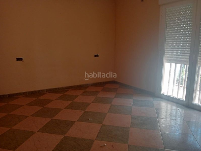 Foto a01628d2-d9ec-4fdb-a085-c9132214d85f. Casa adossada a Mengíbar