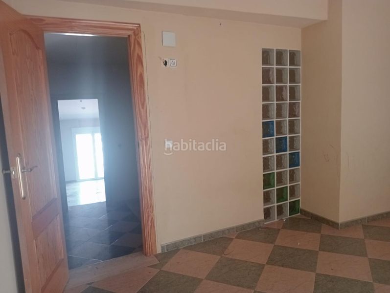 Foto c525f402-bb60-4e70-b7a9-ec4afac1ea28. Casa adossada a Mengíbar