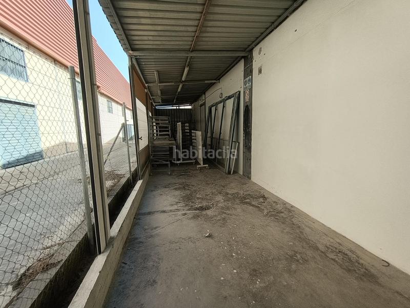 Foto a0a98e27-4d58-4a97-a161-f89b4d38a5be. Nau industrial a Écija
